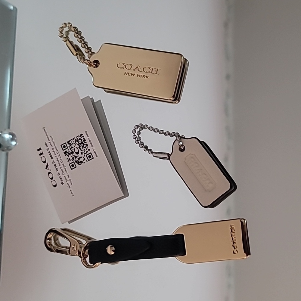 NWOT Bundle of 2 COACH and 1 Calvin Klein Gold Bag Tags.